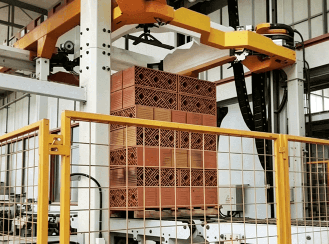 Automated stretch hood wrapping system