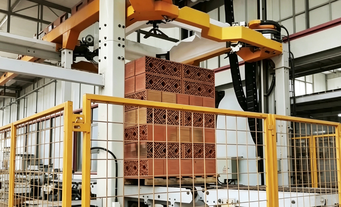 Automated stretch hood wrapping system